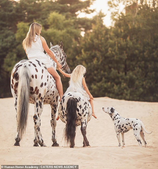 Mother Greetje and daughter Jolie go riding with their identical looking stallion, pony and dalmation